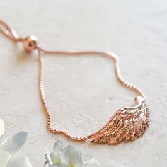 This delicate angel wing bolo bracelet makes the perfect gift for yourself or a loved one. Angel wings represent protection, offering a sense of safety and security. They protect from negative energies and help to reinforce faith and self-empowerment. They also offer an elevated spiritual awareness and understanding, connecting us to the Divine. They convey spirituality and transcendence, a constant reminder that we are watched over and guided through life. 18k gold over sterling silver. Always April Birthstone Jewelry, March Birthstone Jewelry, Bolo Bracelet, Forever Jewelry, Zodiac Jewelry, Spiritual Awareness, Gifts For New Mums, Pearl Jewellery Earrings, Men's Jewelry Rings