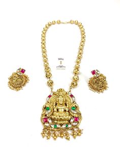 Traditional balls mala in 22Kt gold plating with statement Goddess Lakshmi pendant and jhumka studded in pachi kundans. South Indian jewelry. Bridal jewelry. South Indian necklace. Temple jewelry. South Indian Necklace, Lakshmi Pendant, Rani Haar, Temple Jewelry, South Indian Jewelry, Indian Necklace, Goddess Lakshmi, Jewelry Bridal, Temple Jewellery