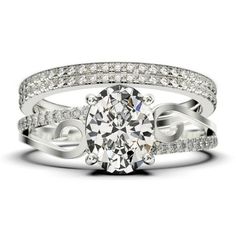 a white gold ring with an oval cut diamond surrounded by pave diamonds on the band