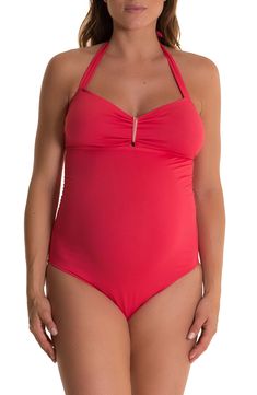 A ruched one-piece swimsuit with a halter neckline features side boning and an elastic band under the bust to provide added support for your changing figure. Style Name:Pez D'Or Solid One-Piece Maternity Swimsuit. Style Number: 473667. Available in stores. Nylon Halter Neck Tankini With Built-in Bra, Halter Neck Nylon Tankini With Built-in Bra, Stretch One-piece Halter Top For Pool, Stretch Beachwear Halter Top With Lined Body, Nylon Halter Neck Swimwear, Stretch Nylon Halter Neck Swimwear, Ruched Stretch Backless Swimwear, Ruched Halter Neck Swimwear For Sunbathing, Nylon Halter Neck Tankini For Poolside