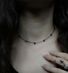 Artemis Dreaming. Βeauty and magic in the most delicately dark way. This necklace is composed of black rhodium over 925 sterling silver delicate sparkling chain, 4 mm round burgundy garnet gemstones. You can choose between these chain lengths: 15 / 16 / 17 / 18 inches Not sure which length to buy? We can add a 1 inch extender chain. Just write a note at checkout! ❈ We send all our items with registered mail. ❉ Due to the organic nature of stones, there might be a slight variation in colour, size and shape. ✺ All items come packaged in a quality velvet pouch ready for gift giving. ✽ If you want to make a special order, just contact us! Dainty Gothic Jewelry, Gothic Sterling Silver Clavicle Necklace, Gothic Sterling Silver Clavicle Chain Necklace, Sterling Silver Gothic Clavicle Necklace, Sterling Silver Gothic Collar Necklace, Elegant Black Hand Forged Necklace, Sterling Silver Witchy Necklace For Gift, Garnet Black Jewelry For Gift, Witchy Sterling Silver Necklace For Gift