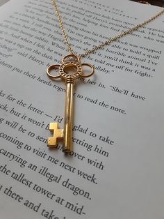 ON SALE NOW! Large golden skeleton key necklace on a beautiful gold chain. Can be made to any length. Also comes in silver and antique bronze. Thanks so much for looking! Vintage Gold Jewelry With Keys, Vintage Gold Necklaces With Keys, Vintage Gold Key Necklace, Gold Key Pendant Jewelry, Gold Pendant Jewelry With Keys, Antique Gold Necklaces With Two Keys, Gold Brass Necklace With Keys, Golden Skeleton, Skeleton Key Necklace