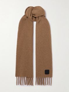 TOTEME's scarf is the perfect addition to your cold-weather wardrobe - the versatile 'Biscuit' shade is so easy to style. Knitted from a cozy alpaca-blend, it's trimmed with fringe and accented with a leather logo patch. Designer Wool Scarves For Winter, Beige Wool Scarves For Winter, Designer Wool Scarves For Fall, Casual Merino Wool Scarves For Fall, Beige Cashmere Scarves For Fall, Brown Wool Scarves For Cold Weather, Casual Alpaca Scarves For Fall, Classic Brown Cashmere Scarf, Brown Wool Casual Scarf