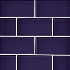 a purple brick wall with white lines on the top and bottom, as well as dark blue tiles