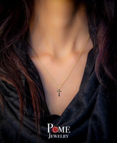 Love innovation? Looking for the new trend? Pome Jewelry is bringing renowned jewelers and enamelists together to create stunning and everlasting jewelry. We've taken fine jewelry and combined it with the art of enamel to produce eye popping pieces, adding much needed flavor to the traditional ways of jewelry. What are you waiting for? Differentiate yourself with this one of kind Dainty cross! A gift for either yourself, your significant other, or your family member - this dainty, yet elegant cr Affordable Silver Cross Pendant Jewelry, Rose Gold Clavicle Chain Jewelry In 14k Gold, Formal Sterling Silver Charm Necklace, Tarnish Resistant, Rose Gold 14k Clavicle Chain Jewelry, Elegant Clavicle Chain Jewelry With Cross Pendant, Elegant Clavicle Chain With Cross Pendant Jewelry, Elegant Clavicle Chain With Cross Pendant, Fine Jewelry White Gold Necklace With Black Enamel, Gold Jewelry With Black Enamel For Anniversary