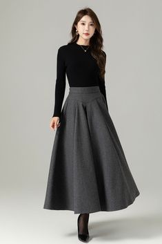 "Fluidity and elegance from this chic winter skirt. Team the wool skirt with a chunky sweater, winter boots and an over sized handbag and you're good to go, no matter what the weather throws at you!  You'll really be able to turn on the charm with this versatile long pleated skirt. The gray color means that you'll match it with literally everything you own. This A line skirt will soon become a staple in your winter wardrobe collection.  DETAIL * 30% wool, 30% fiber, 40% polyester * polyester lining * Two side Seam pockets * Back zipper closure, Back elastic make it more comfortable when wear * Ankle length effect * A Line maxi skirt * Dry clean *  Lean More about the items From the FAQs on the page bottom MODEL SIZE Bust 85 cm(33.4\")  Waist 67 cm(26.7\")  Height 168cm (5' 6\") She wears s Gray Maxi Skirt Outfit For Fall, Long Skirt Reference, Pleated Skirt Work Outfit, Long Skirts Winter, Blouse And Skirt Outfit, Skirt Outfits For Winter, Skirt Outfits Winter, Elegant Skirt Outfits, Maxi Pleated Skirt