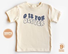 Personalized Kids Shirt - Custom Toddler Retro TShirt with Wavy Name - N is for Name Natural Infant, Toddler & Youth Tee All of the shirts and bodysuits at our shop are CPSIA compliant. We only use Eco-friendly, water-based inks that are also CPSIA compliant and boasts strong washability (highest score on AATCC wash test).  So rest assure to put them on your little ones!  ** COLOR OF T-SHIRTS WILL VARY SLIGHTLY DUE TO LIGHTING AND/OR MONITOR SETTINGS ** DETAILS OF BABY BODYSUITS & T-SHIRTS MAY V Toddler T Shirt Ideas, Toddler Shirts Vinyl, Toddler Tshirt Ideas, Lighthouse Diy, Kids Tshirt Ideas, Kids Tees Design, Kids Tshirt Designs, Personalized Tshirt, Toddler Graphic Tee