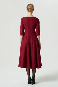 Red A-line Midi Dress For Winter, Red 3/4 Sleeve Midi Dress For Fall, Red Midi Dress With 3/4 Sleeves For Fall, Fitted Knee-length Wool Dress, Winter Wool A-line Dress, Wool Midi Dress For Work, Fitted Wool A-line Dresses, Winter Wool Knee-length Midi Dress, Winter Workwear Dresses With 3/4 Sleeves