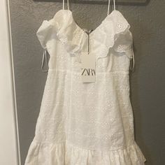 Brand New Chic Cotton Dresses By Zara, Zara Spring Sundress With Ruffles, Zara Ruffled Sundress For Spring, Chic Zara Cotton Dress, Elegant Zara Cotton Dress, Zara Ruffle Sundress, Zara Ruffled Sundress, Zara Cotton Mini Dress With Ruffles, Zara Sundress With Ruffles