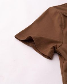 Details: Brown short-sleeve top with front cut-out designTopLength: NormalSleeveLength: Short SleevesMaterials:95% Polyester + 5% Spandex Brown Stretch T-shirt For Summer, Solid Stretch Short Sleeve Crop Top, Brown Stretch Short Sleeve T-shirt, Brown Short Sleeve Cotton Crop Top, Brown Cotton Short Sleeve Crop Top, Solid Color Cap Sleeve Tops For Summer, Brown Stretch Summer T-shirt, Brown Short Sleeve Crop Top For Spring, Spring Brown Short Sleeve Crop Top