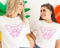 "Big Little Shirts Sorority Shirts Big Little Shirts Sorority Reveal Big Little Sorority Shirts Big Little Reveal Preppy Shirt Big Little Gifts Butterfly Shirt Big/Little Reveal QUICK  FACTS oBella Canvas 3001 Unisex T Shirt o100% Airlume combed and ringspun cotton  oLight Fabric. Retail fit. oTurn garment inside out. Wash and dry normally (on cool for best results). Do not dry clean. Do not iron. oActual product color may vary slightly from the listing photo due to monitor or mobile display. SIZING oAll items are unisex so runs like men's, although not overly large. oMost women find their typical size works best, since they are meant to fit a touch loose oSize guide and fit:  Size/Width/Length (inches) XS / 16.5\"/ 27\" S    /  18   / 28 M   /   20  / 29 L    /   22  / 30 XL  /  24   / 31 White Shirt With School Spirit For Spring, White Short Sleeve Sorority Top, Pink Sorority T-shirt For Summer, Pink Sorority T-shirt For Spring, Sorority Relaxed Fit Graphic Print Tops, Sorority Style Relaxed Fit Graphic Print Tops, White Sorority Tops With Letter Print, Spring Sorority Short Sleeve Tops, Sorority Short Sleeve Tops For Spring