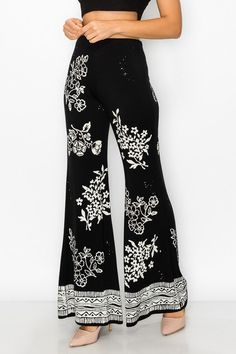 T-Party Soft wide leg flare pants with elastic waistband and floral stamped design. Each pair unique. Length runs a little short. Soft and cozy, feels like you have nothing on. Made in USA. So pretty! Color: Black Sizes: S-M-L-XL Waist 26-28-30-32, Inseam 29-30, fabric is stretchy 93% Micro Modal, 7% Spandex, hand wash or machine cold, made in USAH/MMS75495 Hippie Wide Leg Bottoms With Floral Print, Hippie Style Floral Print Wide Leg Pants, Hippie Wide Leg Floral Print Bottoms, Trendy Flared Bottoms With Floral Print, Casual Flared Bottoms With Floral Print, Hippie Style Wide Leg Floral Print Pants, Black Flare Wide Leg Pants For Summer, Chic Flared Bottoms With Floral Print, Trendy Flare Bottoms With Floral Print