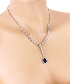 Finish: Silver Platinum plated Material: AAA Zirconia (Pic.10) Color of Teardrop: Navy Blue ,Peach Morganite ,Green Apple ,Aqua Blue or Clear Zirconia. Size of Teardrop: 19mm Necklace~ Length of Necklace: 17.5 inches. We provided two backdrops for you to choose: 1) With 8.5 inches teardrop AAA zirconia pendant backdrop 2) without 2 inches extender Earrings~ Length: 27mm (from top to bottom) Weight: 6g Quantity: Necklace + Earrings Items Condition: 100% Brand New You can find this collection here Nickel-free Teardrop Pendant Jewelry For Formal Occasions, Elegant Hypoallergenic Sapphire Jewelry, Elegant Nickel-free Necklace For Wedding, Nickel-free Teardrop Pendant Wedding Jewelry, Nickel-free Blue Necklaces For Wedding, Sapphire Cubic Zirconia Bridal Necklace Gift, Nickel-free Blue Jewelry For Wedding, Blue Cubic Zirconia Bridal Necklace Gift, Nickel-free Blue Wedding Jewelry