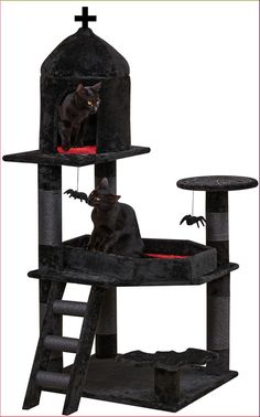 a black cat sitting on top of a scratching tower with a cross in the background