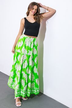 An exquisite woven maxi skirt, adorned with beautiful prints and a comfortable elasticized waistband.. Matching top IT12879Details:Self : 100% CottonSize & Fit- Model is 5`9" And Wearing Size Small- Measurements Taken From Size Small- Approx. Length: 41" Green Floral Print Maxi Skirt, Green Maxi Length Bottoms For Spring, Casual Voluminous Maxi Skirt For Vacation, Voluminous Maxi Skirt With Elastic Waistband For Vacation, Green Floral Print Midi Skirt, Spring Long Green Skirt, Floral Print Relaxed Maxi Skirt For Vacation, Green Long Skirt For Spring, Green Floral Print Relaxed Skirt