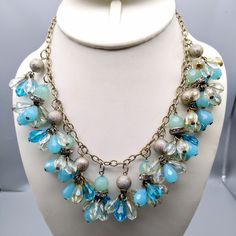 Vintage Mermaid Blue Bib Necklace, Silver Tone Chain with Faceted Crystal Cluster Dangles, Dramatic Flair Statement Jewelry Measurement * 16" with 3" extender unsigned Condition * Very nice condition. Gently used. Size: Womens 16" with 3" extender Condition: Pre-Owned Good Blue Drop Necklace For Party, Blue Costume Jewelry Necklaces With Lobster Clasp, Vintage Blue Teardrop Necklace, Blue Teardrop Drop Necklace For Party, Vintage Blue Beaded Chain Necklace, Blue Necklace With Lobster Clasp For Party, Vintage Blue Necklace With Beaded Chain, Blue Drop Necklaces For Party, Vintage Blue Chain Jewelry