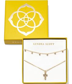 From Kendra Scott&#x2C; the Amelia Cross Necklace Gift Set features:14k gold over brassSpring ring closureShort pendant necklace approx. 19" length Collar necklace approx. 19" length Imported. Kendra Scott Cross Necklace, Western Necklaces, Cross Gift, Holiday Sparkle, Blue Candles, Gold Cross Necklace, Linen Spray, Handbag Charms, Jewelry Tree