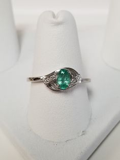 "Thanks for shopping our vintage estate store. We tend to sell well below wholesale and truly hope you enjoy all of our items. Many of the items are one of a kind, so please enjoy scrolling through the pictures and hopefully something will catch your eye. Brown spots are from the camera. Estate ring nice sterling silver 925 natural .25ct emerald with 2 small diamonds. Custom made ring, meaning we set the gem into the setting. Ring size: please select a size Setting: 3/8\" 8mm Band width: 1.5mm W Princess Promise Rings, Ring Meaning, Beach Rings, Diamond Princess, Estate Ring, Estate Rings, Brown Spots, Oval Cut Diamond, Princess Diamond