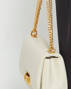 Product Details Our take on the classic chained shoulder bag. Made with premium Italian leather and gold hardware for an ultra luxe look and feel. This simple yet sophisticated design is a new staple. - Gold chain to either hang over shoulder or style crossbody- Clasp fastening at front flap- Internal pocket with zipper- Content: Outer: 100% cow leather; Lining: Faux leather Style# K2103NPPR01L1 Fit Notes - This item measures approximately 10.24 x 6.10 x 2.76" - Chain measures approximately 41.3 Gold Bags For Everyday Luxury In Timeless Style, Gold Timeless Bag For Everyday Luxury, Timeless Gold Bags For Everyday Luxury, Timeless Gold Luxury Bag, Timeless Gold Flap Bag With Gold-tone Hardware, Luxury Chain Bags For Everyday, Classic Gold Flap Bag For Office, Timeless Gold Shoulder Bag With Detachable Strap, Timeless Gold Luxury Shoulder Bag