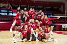 the volleyball team is posing for a group photo