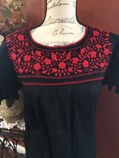 "This beautiful hand embroidered Mexican blouse is comfortable, fresh and stylish Beautiful ruffle sleeves With beautiful flower embroidered detailed work on the top and back Get the Boho & hippie style you like Perfect to wear with your favorite jeans You will love your unique one of a kind piece!! Every blouse is individually handcrafted Color may vary on stitching as each blouse is unique Perfect gift idea **HAND WASH ONLY** Follow us on Instagram @mardiaartesanal MEASUREMENTS Small: Bust Fitted Embroidered Short Sleeve Top, Fitted Embroidered Top With Short Sleeves, Summer Folk Peasant Top With Embroidered Sleeves, Fitted Short Sleeve Top With Embroidered Hem, Fitted Short Sleeve Embroidered Top, Fitted Casual Embroidered Top With Intricate Embroidery, Summer Casual Peasant Top With Intricate Embroidery, Casual Fitted Embroidered Top With Intricate Embroidery, Traditional Short Sleeve Blouse With Tonal Embroidery