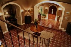 an overhead view of a living room and entry way