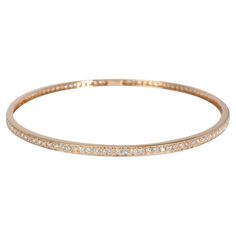 Diamond Bangle in 18k Rose Gold 1.75 CTW PRIMARY DETAILS SKU: 117284 Listing Title: Diamond Bangle in 18k Rose Gold 1.75 CTW Condition Description: Retails for 2995 USD. In excellent condition and recently polished. Chain is 8 inches in length. Metal Type: Rose Gold Metal Purity: 18k Chain or Bracelet Length (in): 8 Pre-Owned Jewelry Condition: Excellent SIDE STONE INFORMATION Side Stone 1 Gem Type: Diamond Side Stone Weight 1 (cts): 1.75 Side Stone 1 Shape: Round Brilliant Side Stone 1 Color: G Diamond Bangle In Rose Gold With Pave Setting, Rose Gold Diamond Bangle With Pave Setting, Rose Gold Bangle With Single Cut Diamonds, Rose Gold Bangle With Pave Setting, Classic Rose Gold Bangle With Diamond Accents, Rose Gold Diamond Bracelet With Pave Setting For Wedding, Rose Gold Tennis Bracelet With Pave Setting As Gift, Rose Gold Pave Diamond Bracelet For Wedding, Rose Gold Pave Setting Bracelet