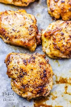 chicken thighs on a baking sheet ready to be cooked