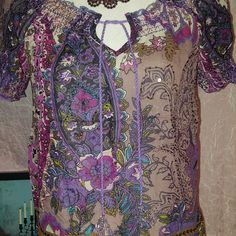 I Cant Say Enough About This Top! Beautiful Colors, Very Unique! Has A Tie At The Front Top, Has Light Elastic At The Arms & Top Of Top Area. Also, Has Different Embellishments Throughout The Top Hard To See In The Pictures. Like New, Never Worn But No Tags. Purple Bohemian Blouse For Spring, Bohemian Purple Blouse For Spring, Bohemian Purple Blouse For Beach, Purple V-neck Bohemian Blouse, Purple Bohemian Tops For Festival, Bohemian Purple Tops For Festival, Casual Purple Blouse For Beach, Casual Purple Blouse For Festivals, Purple Hippie Beach Top