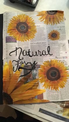 a newspaper with sunflowers on it and the words natural font written in cursive ink