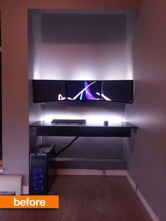 a desk with a computer on it and some lights in the wall behind it that are lit up