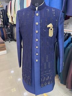 "This is a premium sherwani Indo Western  by Golden Attire crafted from high quality fabric and imported materials. Our products are handcrafted by experienced tailors who make sure the that the stitching is precise, lining is proper and the overall product is sturdy enough to not go out of shape for more than a few years. Also all our products have extra margins in their length, sleeves, sides so it's easily alterable if your size changes after some time. To see more available colours and designs in this collection, Check out the 'Classic premium sherwani Indo Western Section. *This is a premium sherwani Indo Western *We also offer customization so we can provide you an even better fit if you massage us your measurements (in inches) of Chest, Stomach, Waist, Hip, Shoulder and Actual Heigh Designer Nehru Jacket For Eid Reception, Designer Blue Sherwani With Dabka Work, Designer Resham Embroidery Sherwani For Diwali, Designer Sets With Dupatta For Eid, Designer Bandhgala With Dupatta For Reception, Designer Embroidered Sets For Eid, Designer Sets With Intricate Embroidery For Eid, Designer Nehru Jacket With Zari Work For Reception, Designer Kurta For Eid Reception