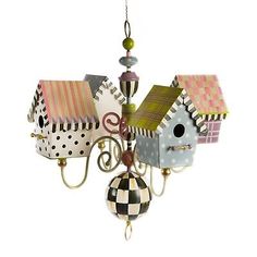 a chandelier made out of bird houses