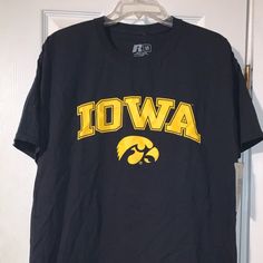 University Of Iowa Hawkeyes Marquee Shirt Smoke Free Closet Size: Large. Color: Black. 100% Cotton. Approximate Measurements While Laying Flat. Armpit To Armpit: 21” Shoulder To Bottom Hem(Length): 28” Iowa And The Hawkeyes Logo Are On The Front. If You “Like” The Item, Try Making An Offer. Please Let Me Know If You Have Any Questions. Thanks For Checking Out My Closet! Iowa Hawkeyes Sweatshirt, Razorback Shirt, Nc State University, Iowa Hawkeye, University Of Iowa, University Tshirt, Tech T Shirts, Clothing Pieces, Blank T Shirts