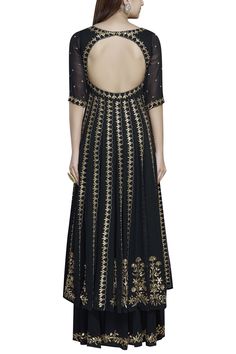 Black kalidar kurta with all over sequin and dabka floral motifs. Comes with palazzo pants and organza dupatta.
Components:3
Gota, sequin, dabka embroidered
Neckline:Wide
Sleeve Length:Elbow
Fabric:Georgette, Organza
Color:Black
Front keyhole with loop button
Sheer sleeves
Back cutout panel
Embroidered palazzos and dupatta
Closure: Anarkali and palazzos: Side zip - Aza Fashions Anarkali Designer Dress With Sequins, Designer Sequin Anarkali Dresses, Sequin Anarkali Designer Dress, Traditional Sequined Dresses For Designer Wear, Traditional Sequin Designer Dress, Anarkali Choli With Sequins For Designer Wear, Anarkali Style Sequined Choli For Designer Wear, Party Style Anarkali Set With Sequins, Sequined Anarkali Set For Reception And Eid