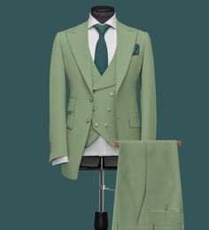 "Men Suits, Suits For men Mint Green three piece Wedding Suit, Formal Fashion Slim Fit Suit - men mint green Suit COMPULSARY PLEASE MEASURE YOUR CHEST AREA, CIRCUMFRENECE AROUND THE BROADEST PART OF CHEST AND WAIST AREA WHERE YOU NORMALLY WEAR YOUR TROUSER OR 4 FINGER BELOW THE BELLY BUTTON, AND PICK YOUR SIZE ACCORDINGLY PLEASE PROVIDE YOUR HEIGHT AND WEIGHT IN THE PERSONALISATION BOX , WHILE PLACING THE ORDER PLEASE CHECK THE SIZE CHART BEFORE PLACING THE ORDER IN SIZE CHART , \"WAIST\" REFERS Green Tuxedo Suit For Wedding, Classic Green Double Breasted Suit For Groom, Green Double Breasted Tuxedo Suit For Wedding, Fitted Green Three-piece Suit For Groom, Green Double Breasted Notch Lapel Suit For Groom, Green Fitted Three-piece Suit For Groom, Fitted Green Three-piece Suit For Grooms, Green Tuxedo Style Three-piece Suit For Wedding, Fitted Green Tuxedo For Wedding