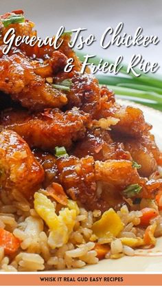 a white plate topped with fried chicken and rice