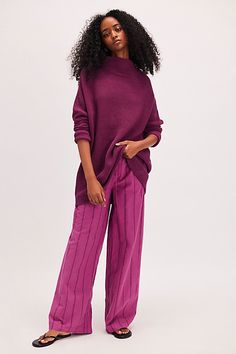 **Fit:** For a more tailored fit, size down. Heavy knit ribbed tunic sweater featured in a slouchy, oversized fit. * Stretchy fabric * Sleek mock neck | Ottoman Slouchy Tunic by Free People in Pink, Size: XL Ribbed Relaxed Fit Turtleneck Sweater, Relaxed Fit Ribbed Turtleneck Sweater, Oversized Ribbed Knit Top For Fall, Chic Ribbed Relaxed Fit Knit Top, Oversized Chic Sweater With Ribbed Neckline, Relaxed Fit Ribbed Sweater For Work, Ribbed Relaxed Fit Knit Top For Winter, Winter Ribbed Knit Top Relaxed Fit, Winter Ribbed Knit Top With Relaxed Fit