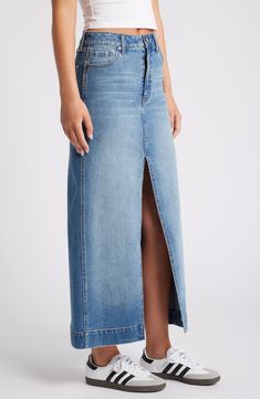 Artistic whiskers and deep sanding add a lived-in aesthetic to a stretch-kissed denim maxi skirt finished with a stem-baring front slit for trendsetting appeal. 37 1/2" length Zip fly with button closure Five-pocket style Front slit Unlined 99% cotton, 1% spandex Machine wash, tumble dry Imported Denim Skirts Online, Blue Denim Skirt, Denim Maxi, Denim Pencil Skirt, Denim Maxi Skirt, Denim Midi Skirt, Business Attire, Skirt Design, Women Skirts Midi