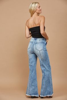 Elevate your wardrobe with these effortlessly chic Wide Leg Palazzo Jeans. Crafted with a unique center seam detail that adds a touch of elegance, these jeans are perfect for adding a boho twist to your everyday style. The frayed hem offers a laid-back, rustic edge, making these jeans ideal for rodeo events or a casual day out. With a comfortable zip fly and button closure, these jeans ensure a secure and snug fit. Key Features: Style: Boho, Western, Rodeo inspired Fit: Wide leg Palazzo design f Palazzo Design, Palazzo Designs, Palazzo Jeans, Rodeo Events, Boho Twists, Western Rodeo, Style Boho, Sweater Blouse, Denim Fabric