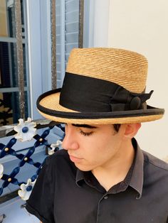 Homburg straw hat inspired by the Edwardian-era men's hats of the early 20th century. This hat is one of my favorites for summer for its elegance and personality. It is a unique and exclusive design made with one of my wooden hatblocks from my collection. Made with very fine 6/7 millimeter natural straw braid. The hat is adorned with a 70mm wide black grosgrain ribbon and another small 25mm grosgrain at the end of the hat brim. You have the option to change the color of the grosgrain by choosing Vintage Brimmed Panama Hat For Formal Occasions, Vintage Formal Brimmed Panama Hat, Vintage Formal Panama Hat With Brim, Vintage Adjustable Panama Hat For Formal Occasions, Adjustable Vintage Panama Hat For Formal Occasions, Natural Summer Hat For Formal Occasions, Natural Panama Hat For Formal Summer Occasions, Natural Panama Hat For Formal Summer Events, Formal Natural Panama Hat For Summer