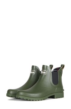 This durable lug-sole rain boot is topped with elastic gore insets for easy-on styling. Rubber and synthetic upper/textile lining/synthetic sole Imported Rain Boots Women, Chelsea Rain Boots, Black Olive, Rain Boot, Lug Sole, Rain Boots, Chelsea Boots, Chelsea, Nordstrom