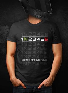 Sportsbike 1N23456 Gear Shift T-Shirt Biker Tshirt Designs, Black Crew Neck T-shirt For Biker Events, Moto Style Graphic Print Crew Neck T-shirt, Black Short Sleeve T-shirt For Cycling, Black Graphic Tee For Motorcycling, Moto Style Letter Print T-shirt For Biker Events, Crew Neck Top With Letter Print For Motorcycling, Black Racing T-shirt With Letter Print, Sporty Short Sleeve T-shirt For Motorcycling