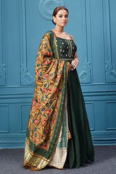 Buy a dark green embroidered sleeveless Anarkali suit with a floral mustard dupatta. Dazzle on special occasions with exquisite Indian designer dresses, sharara suits, Anarkali suits, bridal lehengas, and sharara suits from Pure Elegance Indian clothing store in the USA. Shop online from Pure Elegance. Green Maxi Length Choli With Dupatta, Green Choli With Dabka Work, Sleeveless Green Anarkali Set With Dupatta, Sleeveless Anarkali Lehenga With Dabka Work, Anarkali Lehenga With Dabka Work, Green Maxi Length Sharara With Pallu, Green Dola Silk Churidar With Sheer Dupatta, Green Floor-length Anarkali Set With Dupatta, Green Maxi Sharara With Zari Work