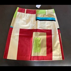 Cute And Colorful Retro Feel Mini. Tan, White, Red, Chartreuse, Black And Aqua In Geometric Patterns. Two Rear Button Pockets With Extra Button. Waist Approximately 14” Wide Length Approximately 19” 100% Cotton. Size 2 Nwt Questions? Please Ask! Offers Welcome Chic Multicolor Cotton Skirt, Trendy Multicolor Lined Mini Skirt, Retro Multicolor Cotton Skort, Grey Academia, Retro Multicolor Mini Skirt, Playful Multicolor Mini Skirt, Multicolor Mini-length Cotton Skort, Trending Fashion, Retro Color