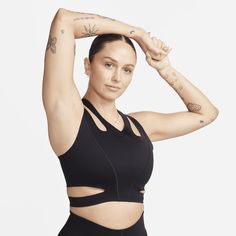 Feel fierce in whatever you do in this strappy sports bra. Its sleek, midweight fabric feels supportive in all the right places. With sweat-wicking tech and plenty of cutouts, you can stay cool and dry whether you're powering through a workout or busting out some moves on the dance floor. Sweat Resistant 4-way Stretch Sports Bra For Pilates, Sweat Resistant Sports Bra For Pilates With 4-way Stretch, Pilates Sports Bra With 4-way Stretch And Sweat Resistance, Nike Sports Bra With Built-in Bra For Training, Nike Sports Bra With Built-in Padding, Functional Sports Bra With Go-dry And 4-way Stretch, Functional Sports Bra With 4-way Stretch And Go-dry Technology, Black 4-way Stretch Racerback Sports Bra, Black Racerback Sports Bra With 4-way Stretch