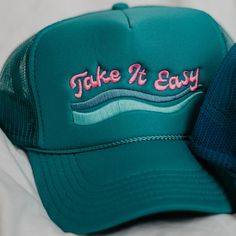 Searching for a relaxed and comfortable hat to take on your next adventure? Look no further than the Take It Easy Foam Trucker Hat! Perfect for the lake. The foam trucker hat is perfect for keeping you cool all day in hot weather. 65% cotton, 35% polyester machine wash delicate or hand wash one size fits most adjustable back mesh netting snapback closure Katydid Wholesale offers an unbeatable selection of wholesale hats and t-shirts for all occasions. Our wholesale hats feature over 1000 varieti Trendy Summer Baseball Cap For Outdoor Activities, Summer Travel Trucker Hat, 5-panel, Green Summer Trucker Hat For Outdoor Activities, Trendy Snapback Baseball Cap For Outdoor Activities, Trendy Trucker Hat For Summer Outdoor Activities, Green 5-panel Trucker Hat For Beach, Trendy Trucker Hat With Curved Brim For Travel, Casual Summer Snapback Hat For Camping, Blue Trucker Hat For Camping