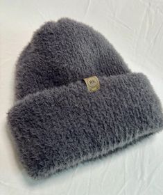 Handmade knit hat for adults Made with super soft nylon yarn Gray Beanie For Fall Outdoor Activities, Gray Beanie For Outdoor Fall Activities, Gray Warm Beanie For Outdoor, Warm Gray Beanie For Outdoor, Gray Soft Knit Beanie One Size, Warm Winter Hat In Plain Color, Snug Beanie For Cold Weather, Gray Knit Winter Hat, Gray Knit Beanie Hat