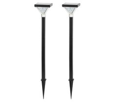 two black and white street lights on a white background