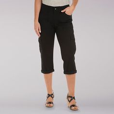 Updated style and all-day comfort in a cargo-inspired capri. You’ll love the soft fineline stretch twill fabrics, cute cargo pocket styling, and adjustable hem that you can roll up or down to vary your style. Add in a comfort elastic knit waistband and you’ll enjoy your style in comfort all day. Stretch Twill: 98% Cotton/2% Spandex 5.8oz. Black. 10 W / M L. Pattern: Womens Capris, Cargo Pocket, Cropped Style, Roll Up, Bermuda Shorts, Casual Pants, Capri Pants, Capri, Mens Short